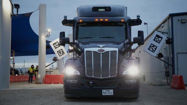 A photo of the front of a self-driving truck. 